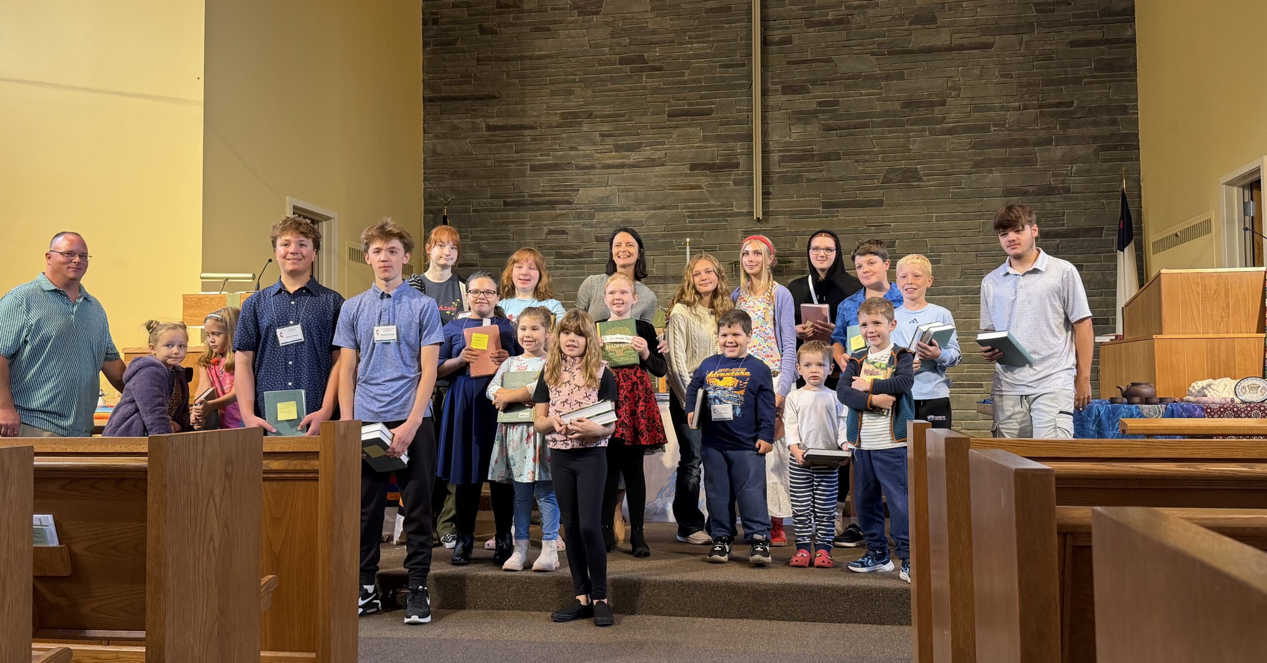 Sunday School children getting new bibles