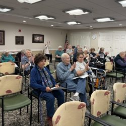 Residents at Hawthorne Ridge listening to FUMC EG Choir